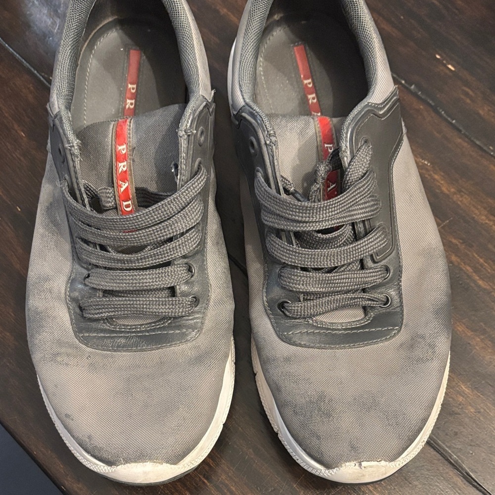 Prada Men’s Gray Canvas Sneakers with Red Logo Stripe - size 9